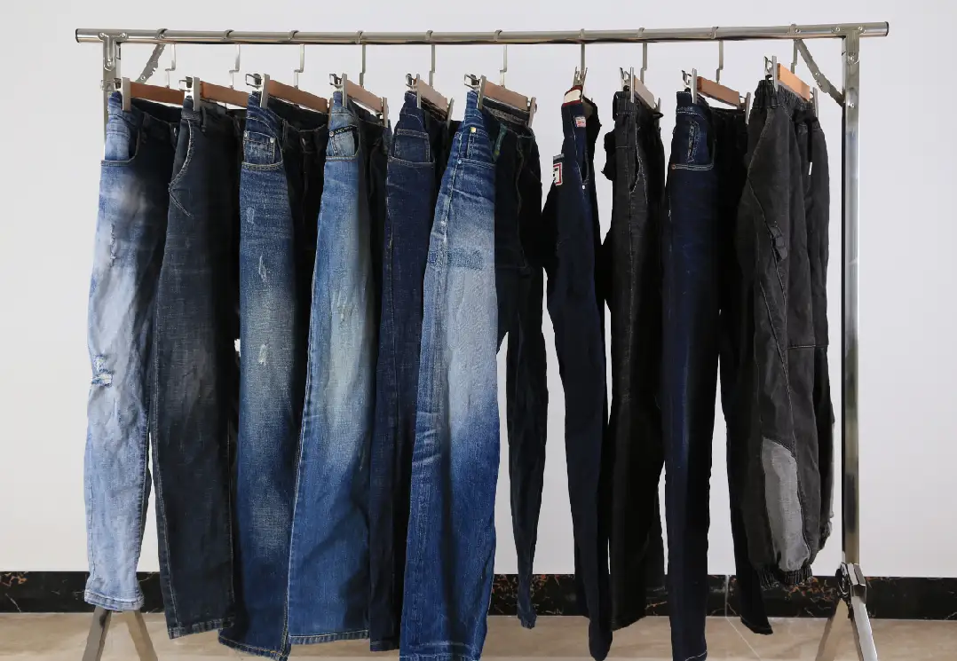 Rack of assorted denim jeans mitumba