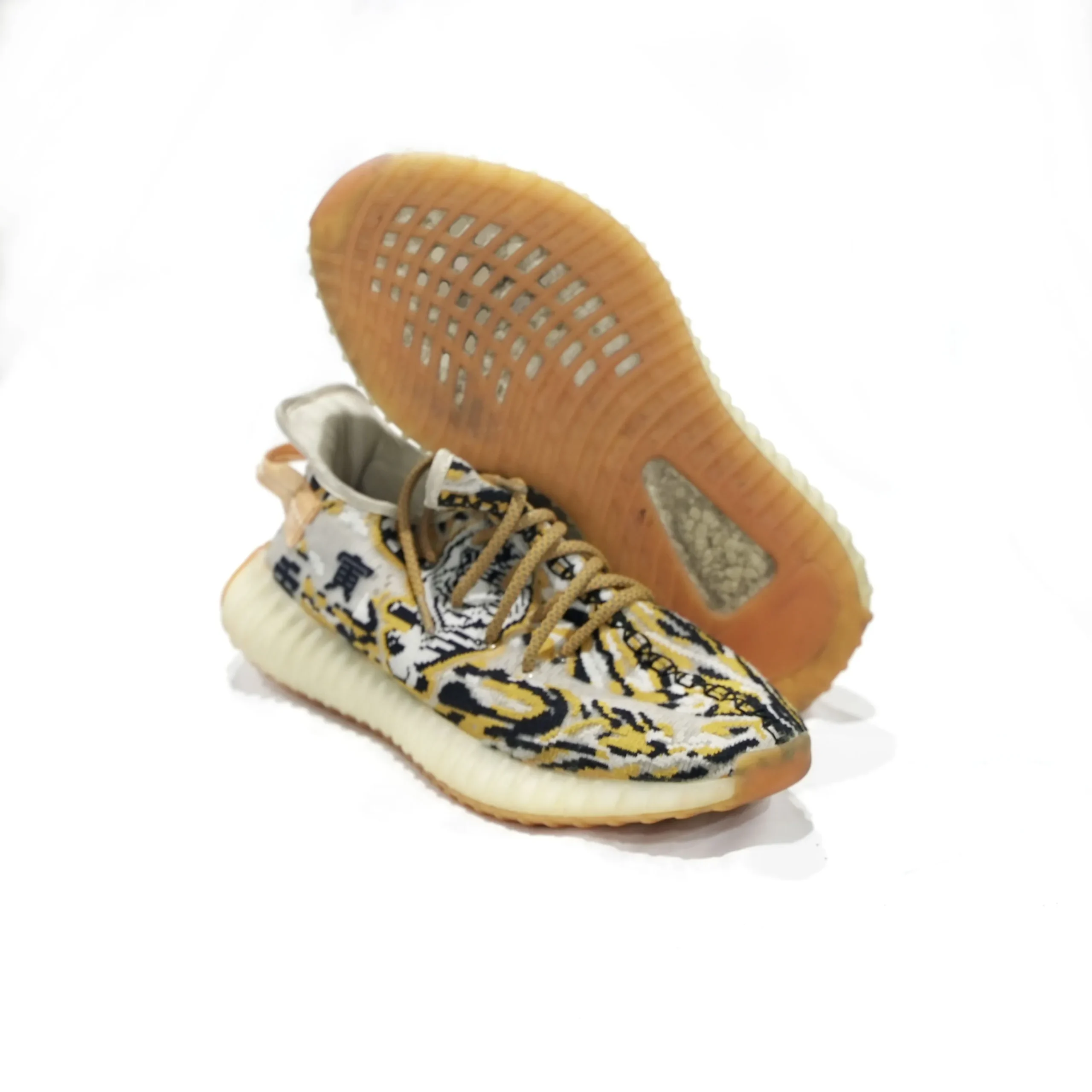 Domestic and fashion footwear — identifying designer pieces in used shoe bales