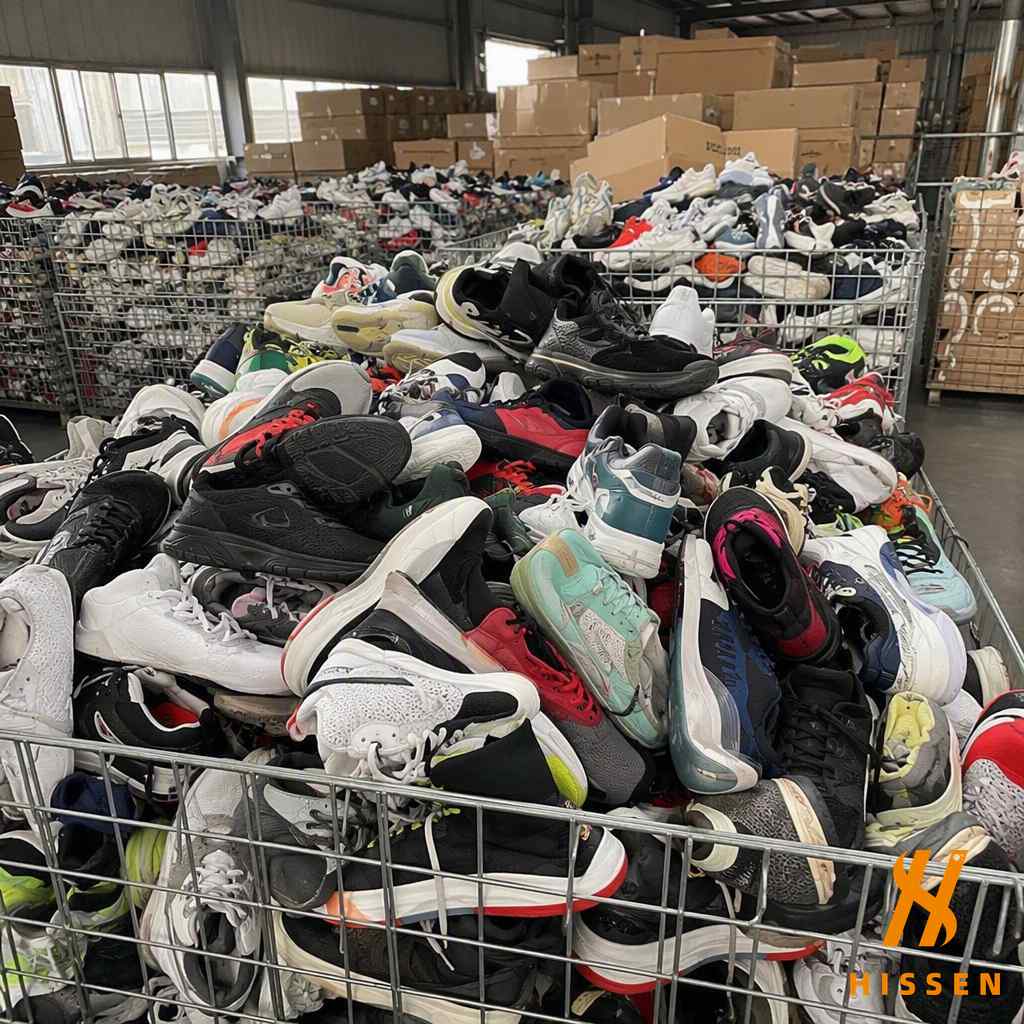 Wholesale warehouse with large inventory of second hand sneakers ready for bulk purchase